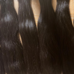 Bundles of varied lengths hair extensions.